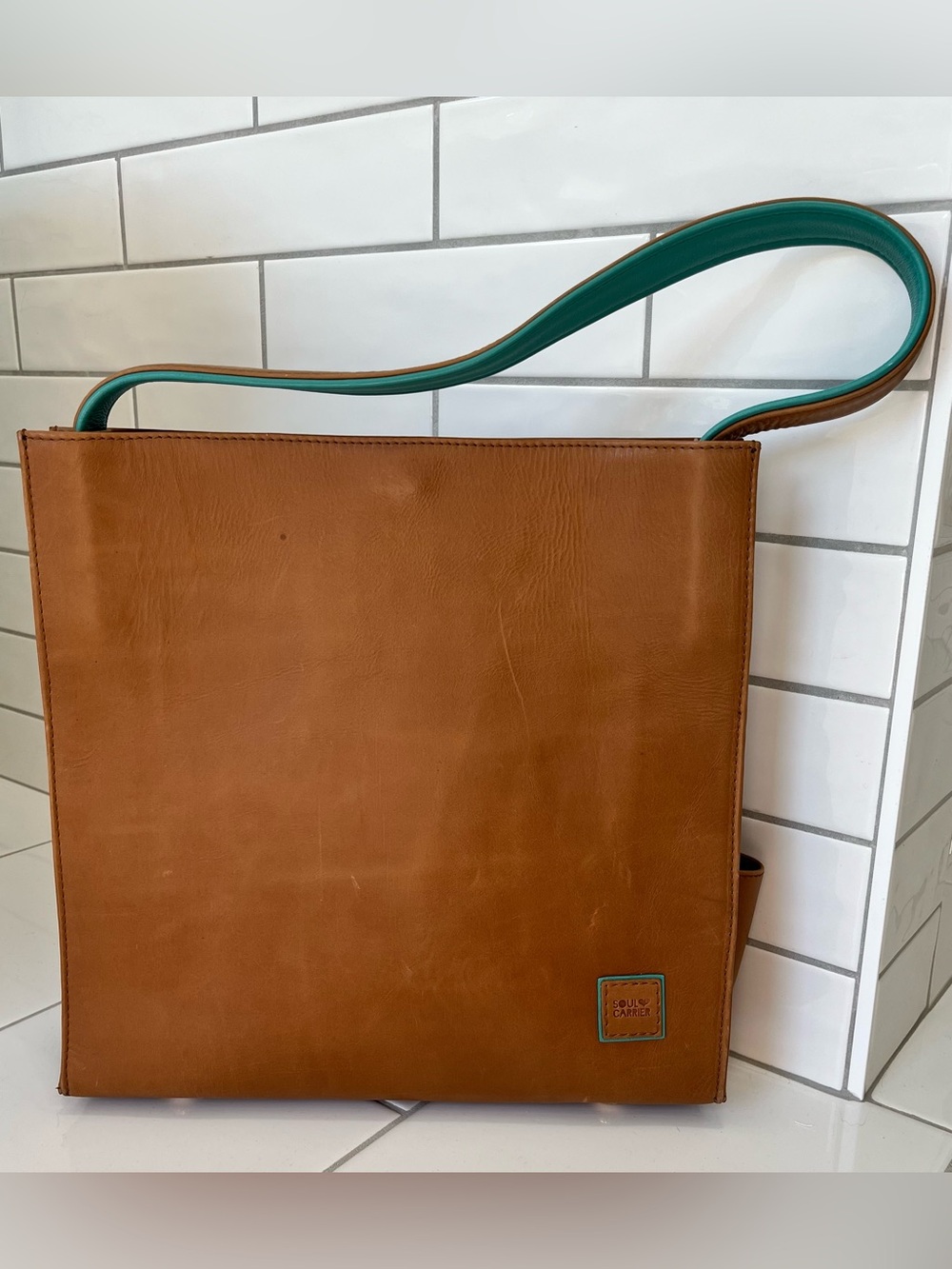 Structured Tan Leather Messenger Bag with Teal-Trim Strap